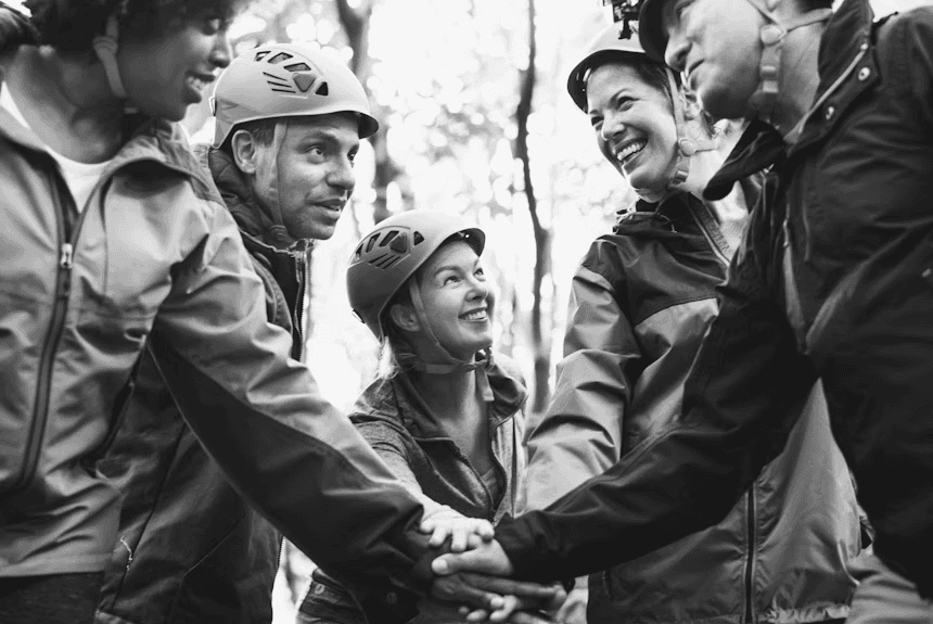 Group of friends smiling together outdoors